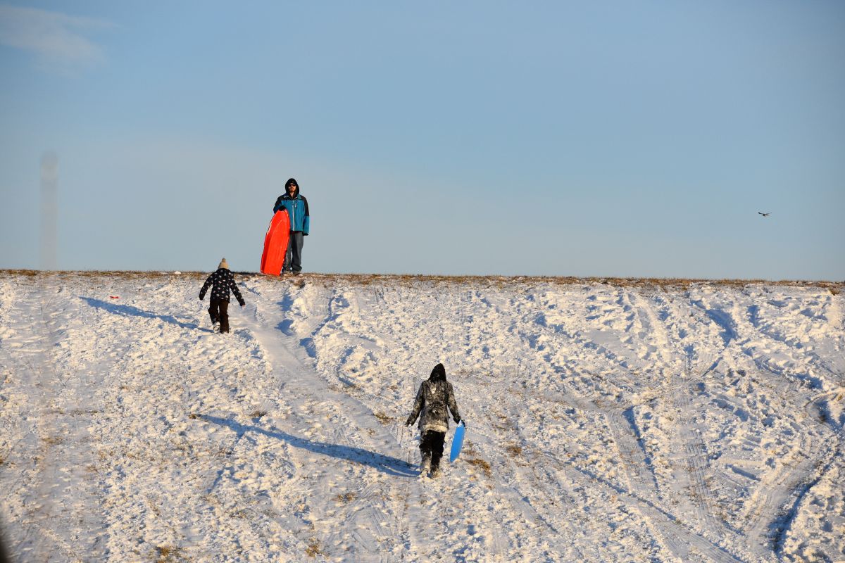 kids sledding in Defiance